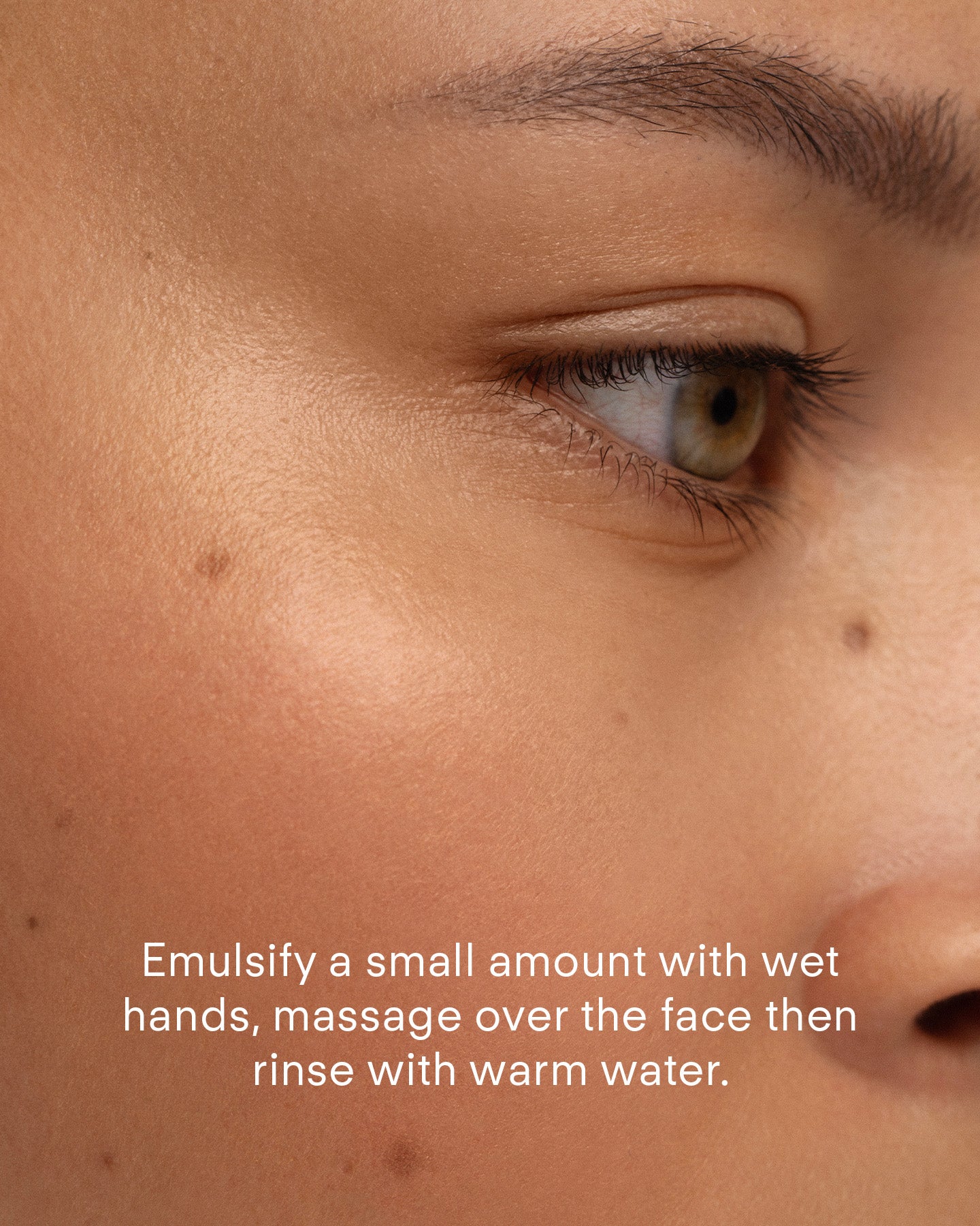 A close-up shows smooth skin and an eye. Text reads: Emulsify Ultra Balancing Gel Cleanser with wet hands, massage over face, then rinse with warm water for hydration.