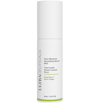 A white bottle of Even Skintone Smoothing Serum Mild features vertical branding and green text, containing 30 mL (1.0 fl oz) of facial serum with AHAs and niacinamide for gentle exfoliation.