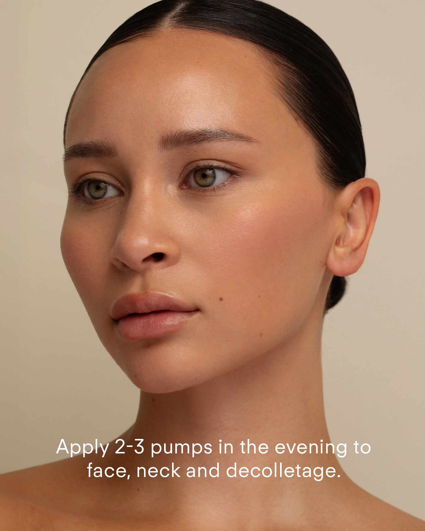 A woman with smooth, glowing skin looks slightly to the side against a beige background. Text reads: Apply 2-3 pumps of Ultra A Perfecting Serum Mild nightly to face, neck, and decolletage to help reduce wrinkles.