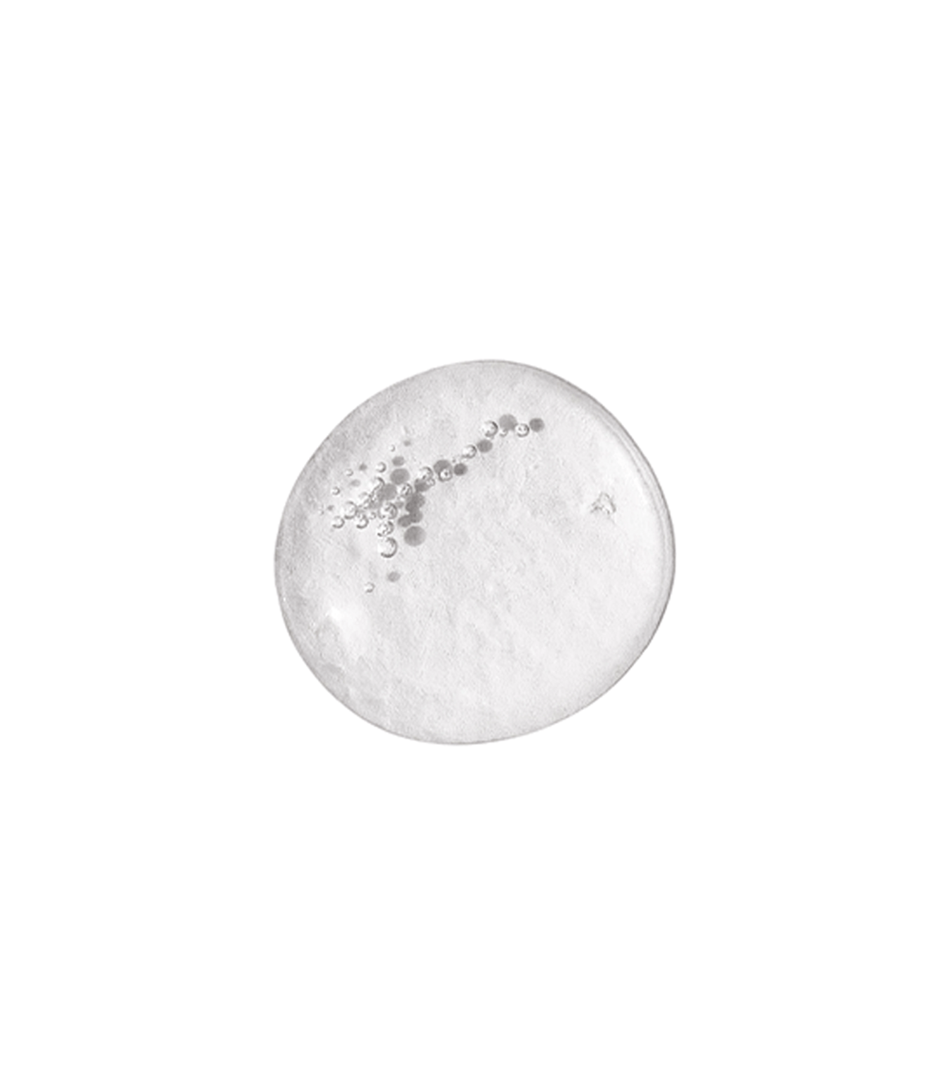 Even Skintone Smoothing Serum Mild appears as a clear, circular gel drop with tiny bubbles and niacinamide, displayed on a white background.