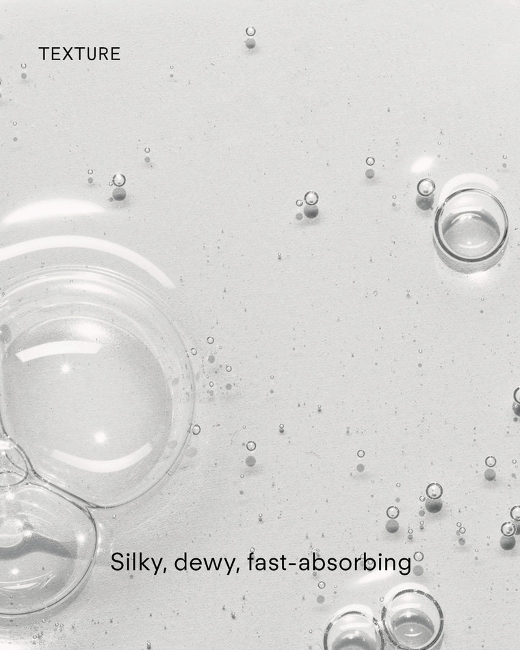 Ultra B² Hydrating Serum features a clear gel texture with bubbles. Overlaid words—TEXTURE, Silky, Dewy, Fast-Absorbing—highlight this hyaluronic acid serum’s refreshing look and feel.