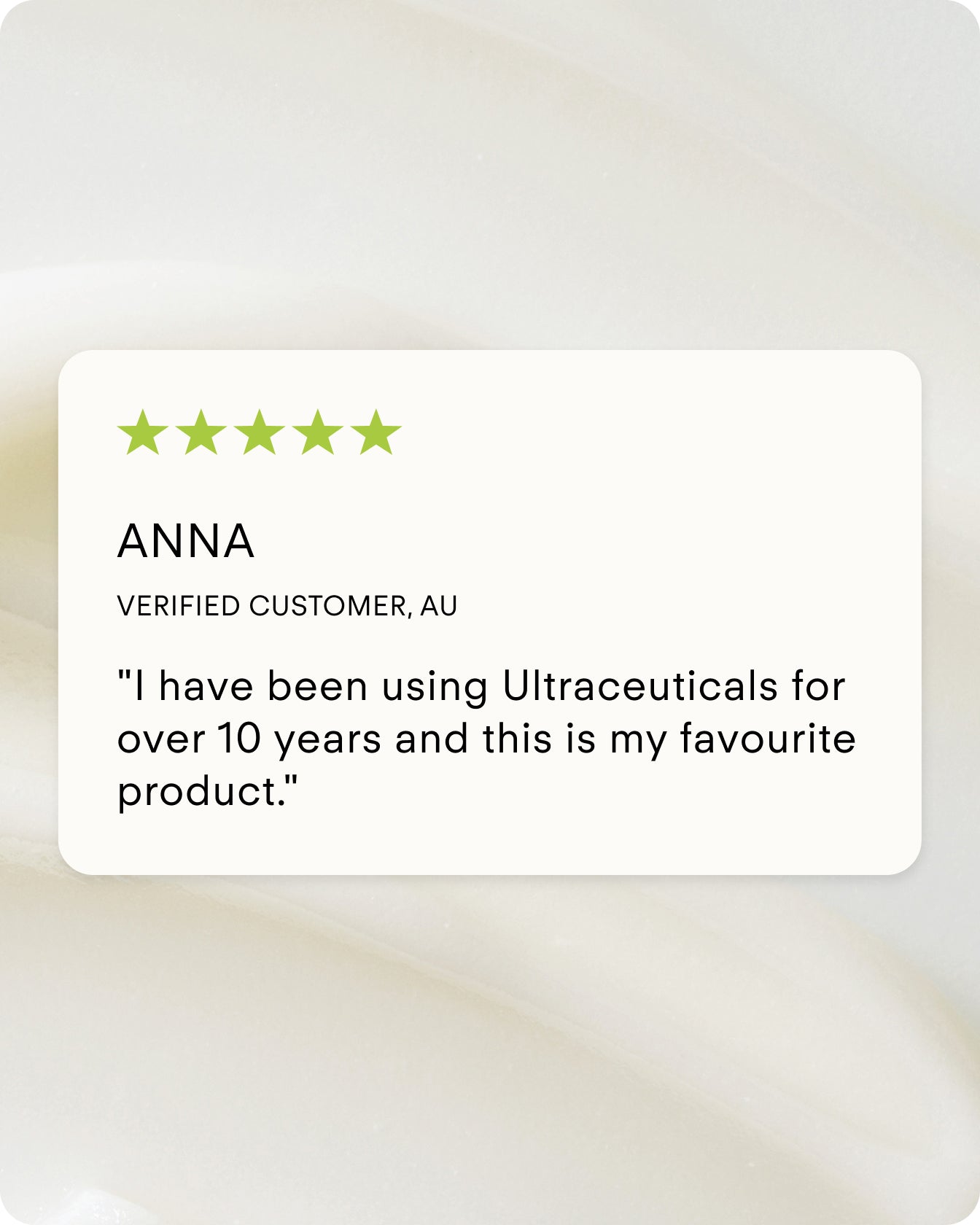 A five-star customer review from Anna shares that she has used A Renewal Retinome Facial Serum for over 10 years and it remains her favorite. The review is shown on a light, creamy background.