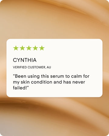 A five-star review from Cynthia, a verified customer in Australia, says: “Been using Ultra R.E.D Corrective Serum to calm my skin condition and it has never failed!” The background shows soft, beige abstract swirls.