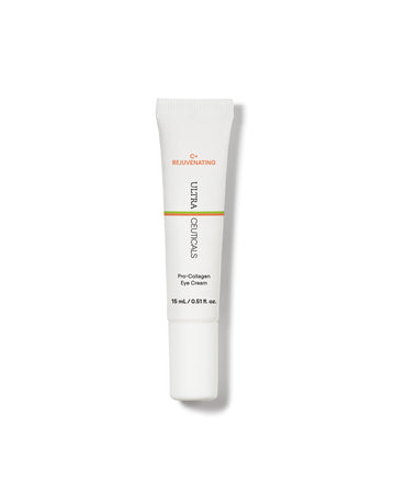 A white tube of Ultra C Firming Concentrate, 15 mL, with a screw cap and minimal black, orange, and green text stands upright on a white background. Contains vitamin C to brighten and refine skin texture.