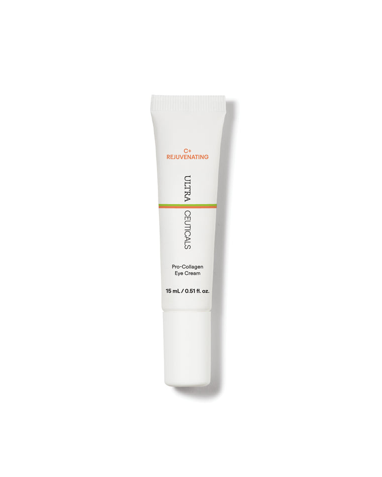 A white tube of Ultra C Firming Concentrate, 15 mL, with a screw cap and minimal black, orange, and green text stands upright on a white background. Contains vitamin C to brighten and refine skin texture.