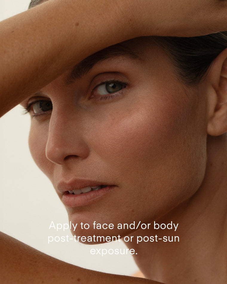 A close-up of a woman's face with her arm raised, partially covering her forehead. Text: Apply Ultra B² Recovery Cream to face and/or body after treatments or sun exposure for hydration.