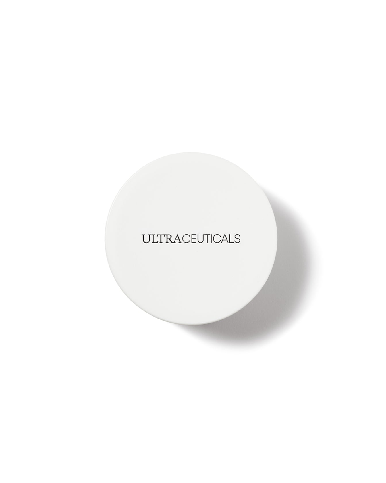 A round, white container labeled ULTRACEUTICALS in bold black letters rests on a plain white background with a subtle shadow—ideal for storing your Ultra Rich Moisturiser Cream.