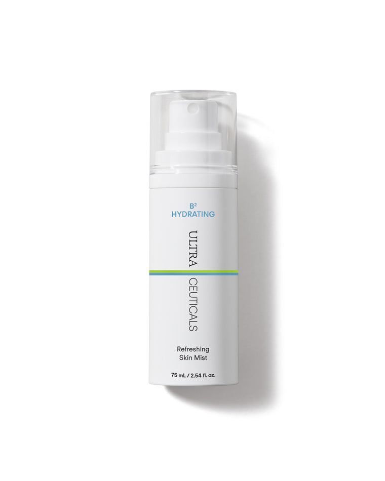A white bottle of Ultra Hydrating Skin Mist with a clear cap, green and blue lines, contains 75 mL (2.54 fl. oz.), and features sodium hyaluronate for enhanced hydration.