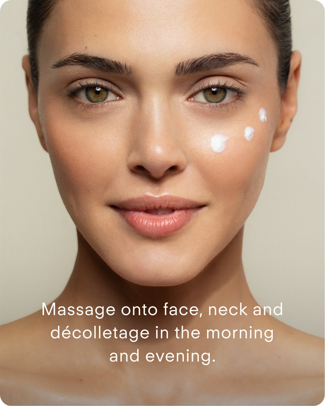 A woman with clear skin and nude makeup applies Ultra Hydrating Lotion to her right cheek. Text reads: Massage onto face, neck, and décolletage morning and evening to boost hydration and support your skin barrier.