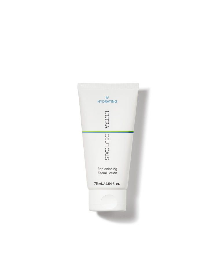 A 75 ml white tube of Ultra Hydrating Lotion, featuring green and silver accents, stands upright on a plain white background. Designed to boost skin hydration and support the barrier.