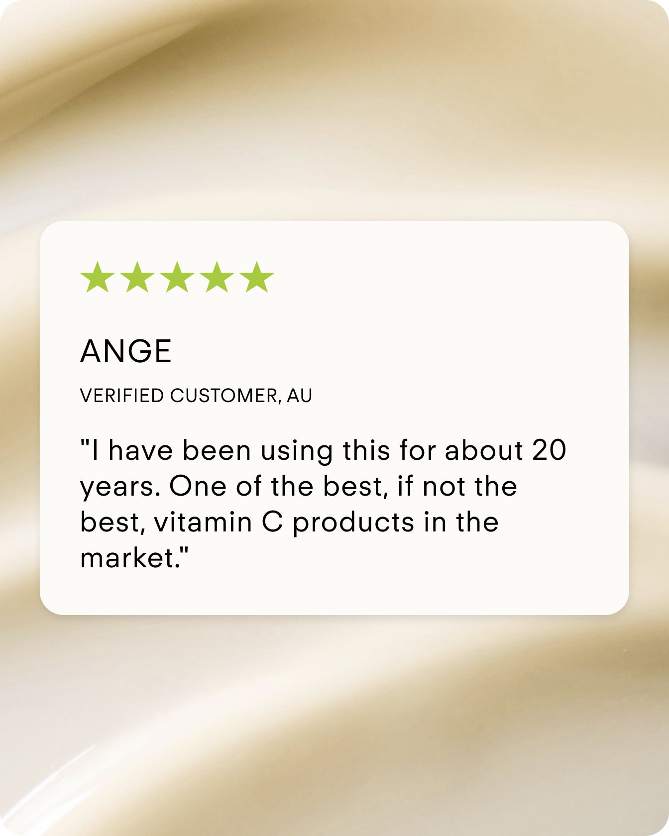 A customer review card displays five green stars and a testimonial from Ange, verified buyer, praising the C+ Rejuvenating Pro-Collagen Night Cream for brightening skin and being her go-to after 20 years. Creamy, abstract background.