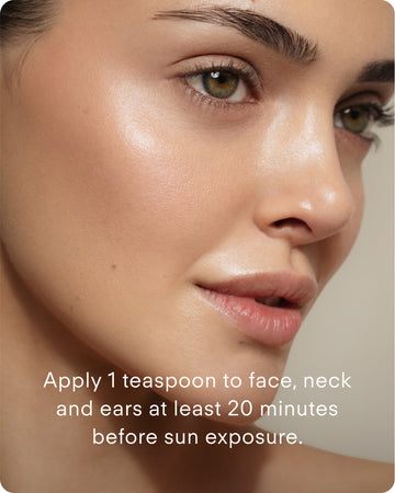 Close-up of a woman's glowing skin, looking to the side. Text: Apply 1 tsp of Ultra UV Protective Daily SPF30 Hydrating sunscreen to face, neck, and ears at least 20 minutes before sun exposure.