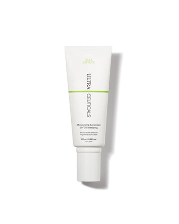 A white tube of Ultra UV Protective Daily Moisturiser SPF 30 Mattifying with green accents and black text stands upright against a plain white background, offering broad-spectrum UVA/UVB protection.