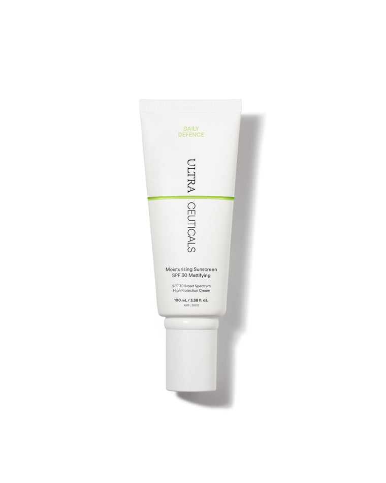A white tube of Ultra UV Protective Daily Moisturiser SPF 30 Mattifying with green accents and black text stands upright against a plain white background, offering broad-spectrum UVA/UVB protection.