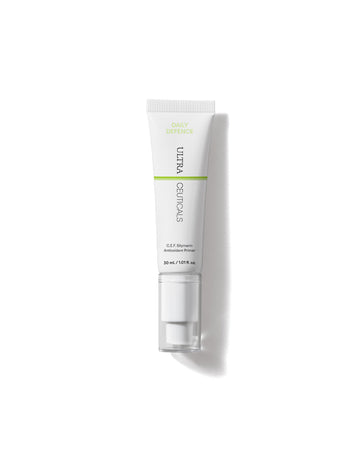 A white tube of Ultra Protective Antioxidant Complex with green accents and a pump dispenser, labeled C.E F Serum Antioxidant Power, provides antioxidant protection to enhance skin resilience, photographed on a white background.