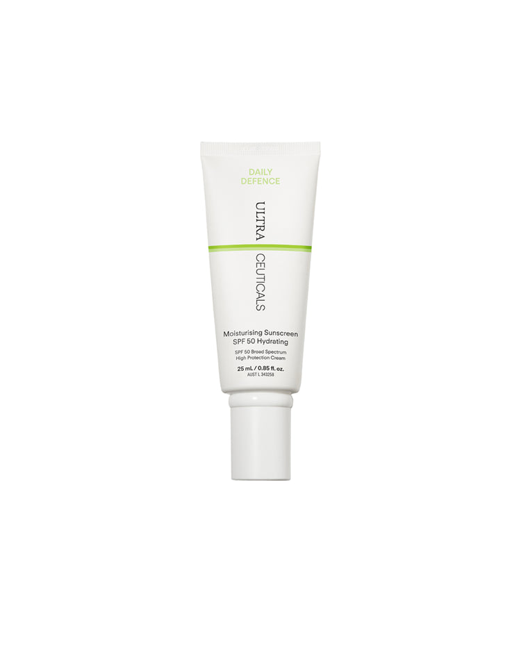 A white tube of Daily Defence Moisturising Sunscreen SPF 50 Hydrating Mini with green and black text and a white flip-top cap stands upright against a plain white background.