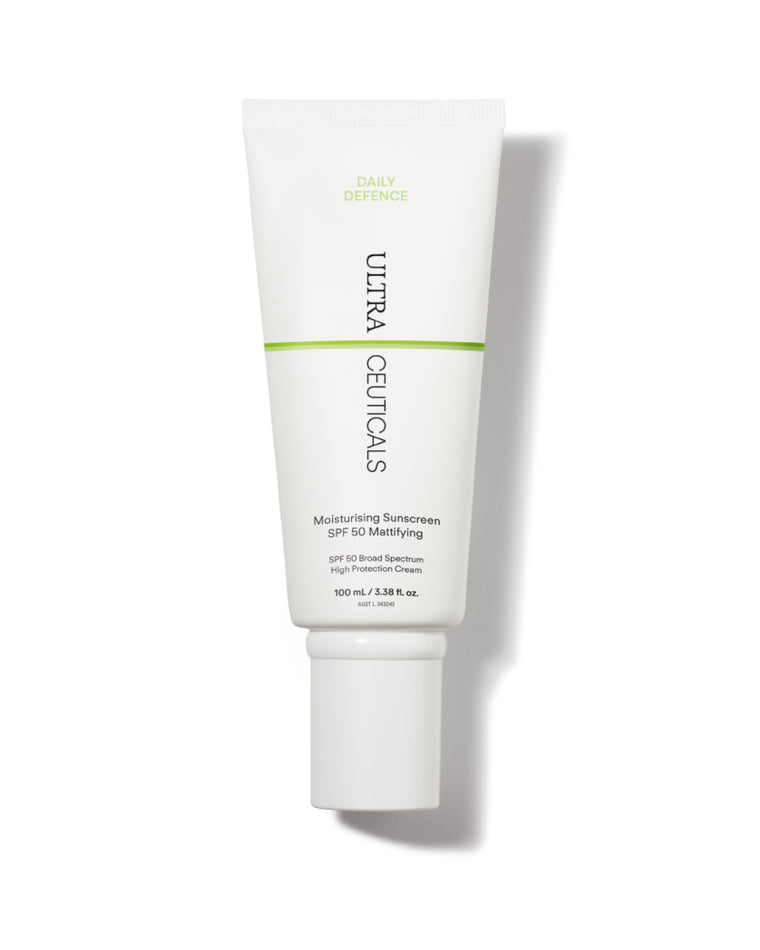 A white tube of Ultra UV Protective Daily SPF50 Mattifying, ideal for oily skin, stands upright on a white background. The packaging features green and black text and provides broad-spectrum sunscreen protection.