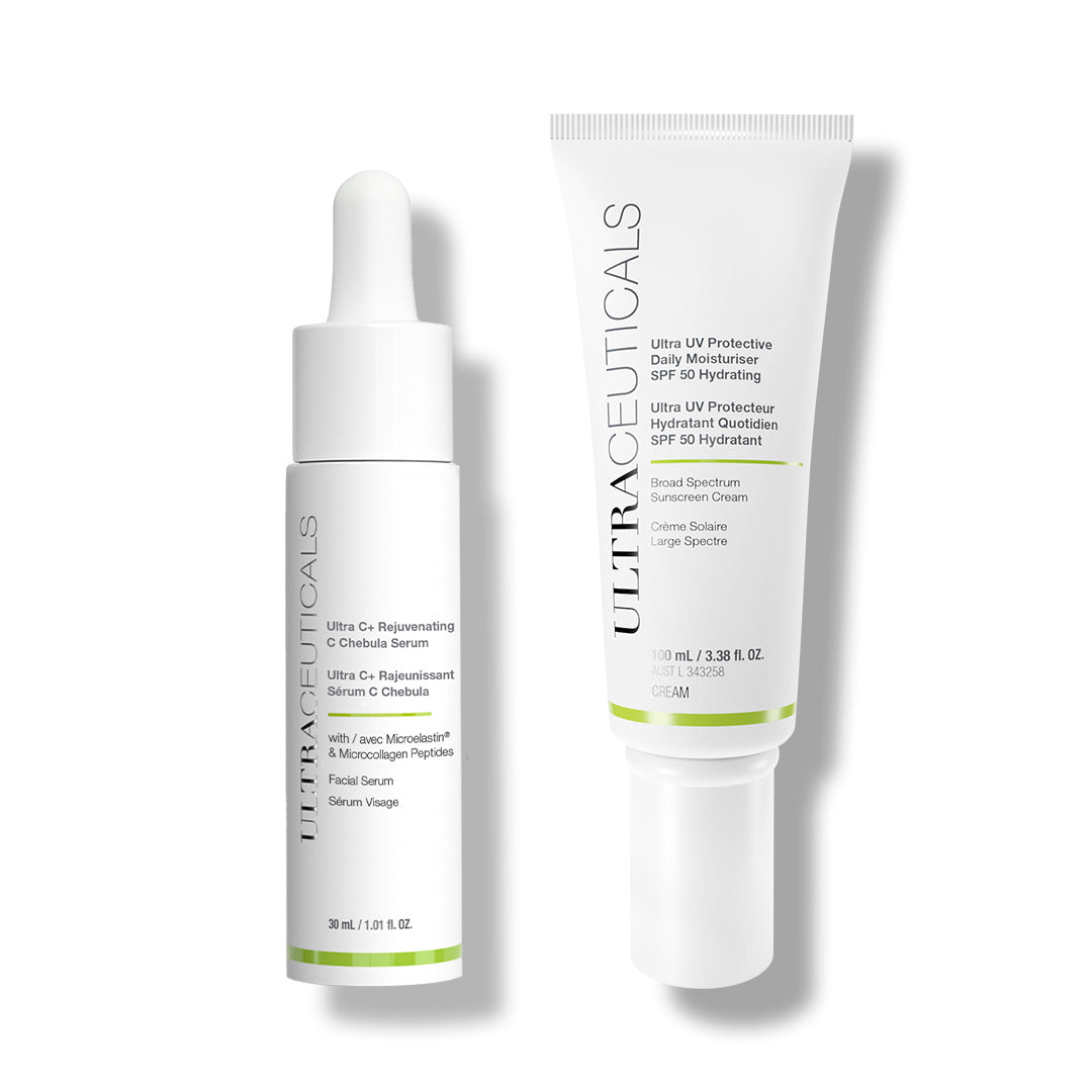 The Ultra C Firm & Protect Set features two Ultraceuticals products: a white dropper bottle (Vitamin C serum) and a white tube (SPF 30 Hydrating Moisturizer), both with green accents, displayed on a white background.